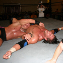 Chase Stevens covers Chris Harris for the winning pinfall