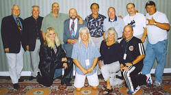 Front:Baby Doll, Ricky Morton, Penny Banner, George South. Back:James J. Dillon, Tully Blanchard, Nikita Koloff, Ivan Koloff, Larry Zbyszko, Bob Caudle, Ole Anderson, Robert Gibson